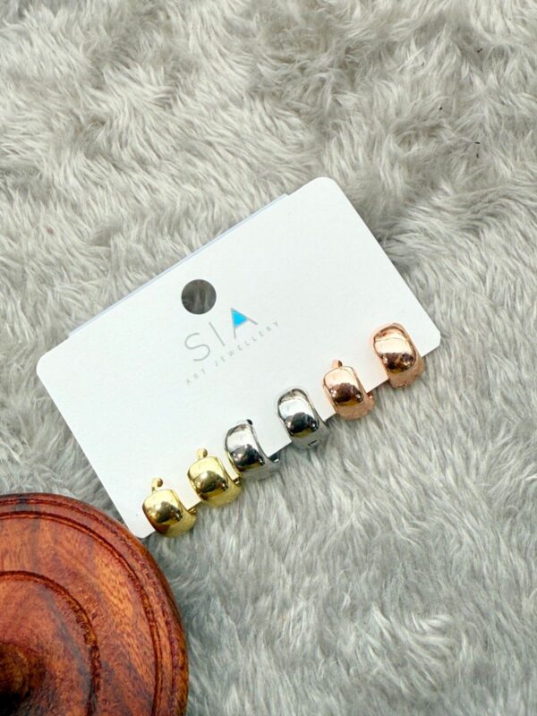 SLEEK POLISHED TRIPLE-TONE COMBO SET STUDS E-182